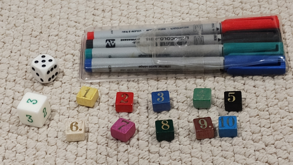 The pens counters and dice that came with early copies of Railway Rivals